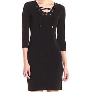 LBD Black three-quarter sleeve Calvin Klein dress with gold details